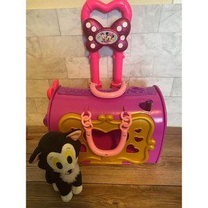 Minnie Mouse pet carrier and Figaro